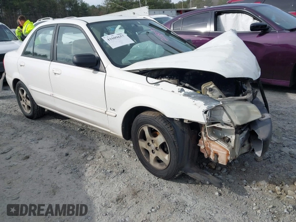 2000 Mazda Protege DX with VIN JM1BJ2221Y0208156, listed as a IAAI auction lot 41609657 with 435,304 mi miles and . Bid and sale history available at DreamBid. Image 1.