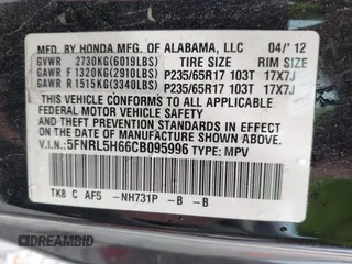 2012 Honda Odyssey EX-L with VIN 5FNRL5H66CB095996, listed as a IAAI auction lot 42446499 with 198,016 mi miles and . Bid and sale history available at DreamBid. Image 9.