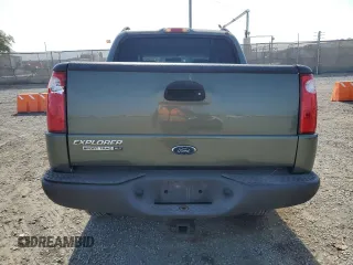 2004 Ford Explorer Sport Trac XLS with VIN 1FMZU67K64UA39174, listed as a Copart auction lot 61035465 with 196,912 mi miles and Salvage title. Bid and sale history available at DreamBid. Image 6.