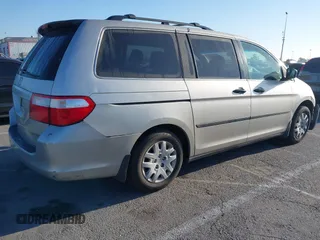 2006 Honda Odyssey LX with VIN 5FNRL382X6B070122, listed as a IAAI auction lot 41870970 with 243,026 mi miles. Bid and sale history available at carsss.com. Image 4.