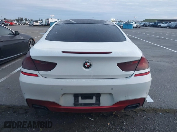 2013 BMW 6 Series 650i with VIN WBAYM9C57DDW20312, listed as a IAAI auction lot 41861212 with 98,662 mi miles and . Bid and sale history available at carsss.com. Image 16.