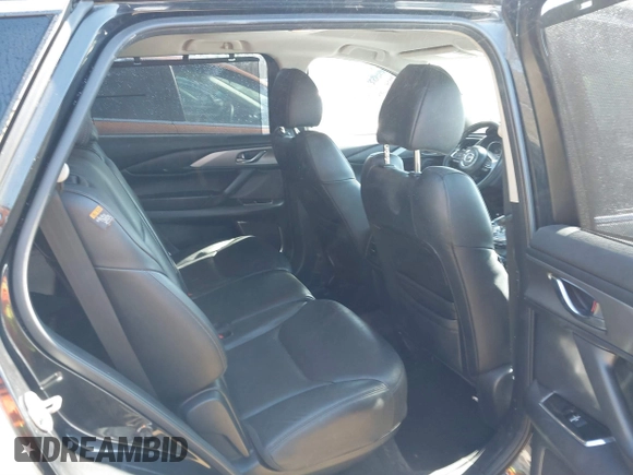 2018 Mazda CX-9 Touring with VIN JM3TCBCY3J0228231, listed as a IAAI auction lot 41596236 with 133,481 mi miles and . Bid and sale history available at DreamBid. Image 8.