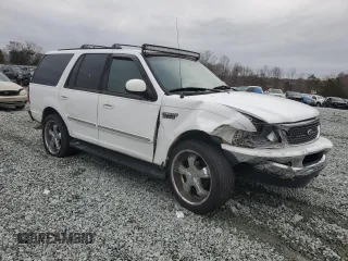 1997 Ford Expedition XLT with VIN 1FMEU17L5VLB80125, listed as a Copart auction lot 83892824 with 257,738 mi miles and Salvage title. Bid and sale history available at DreamBid. Image 4.