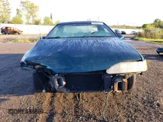 1995 Ford Thunderbird LX z VIN 1FALP6248SH176946, wystawiony jako Copart lot #74066554 z przebiegiem 72 666 mil mil oraz Szkoda całkowita • Salvage title. Historia ofert i sprzedaży dostępna na DreamBid. Obrazek 5.