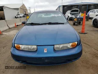 2001 Saturn SL z VIN 1G8ZH54811Z357837, wystawiony jako Copart lot #55210895 z przebiegiem 217 799 mil mil oraz Nie do naprawy. Historia ofert i sprzedaży dostępna na DreamBid. Obrazek 5.