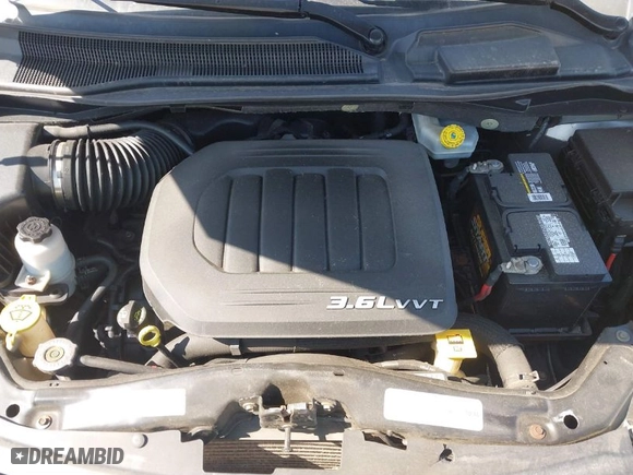 2013 Chrysler Town & Country Touring with VIN 2C4RC1BG7DR620791, listed as a IAAI auction lot 41777244 with 126,426 mi miles. Bid and sale history available at carsss.com. Image 10.