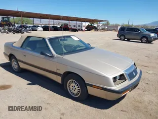 1992 Chrysler LeBaron with VIN 1C3XU4532NF283782, listed as a IAAI auction lot 41841326 with 99,528 mi miles and . Bid and sale history available at DreamBid. Image 1.
