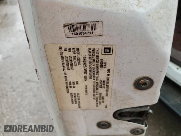 1997 GMC Suburban z VIN 1GKGK26JXVJ715765, wystawiony jako Copart lot #73188284 z przebiegiem 301 101 mil mil oraz Szkoda całkowita • Salvage title. Historia ofert i sprzedaży dostępna na DreamBid. Obrazek 13.