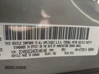 2014 Dodge Grand Caravan SXT with VIN 2C4RDGCG4ER106106, listed as a IAAI auction lot 41830512 with 135,044 mi miles and . Bid and sale history available at DreamBid. Image 9.