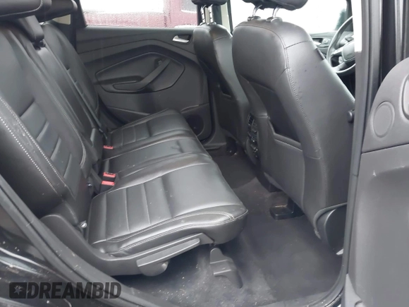 2015 Ford Escape Titanium with VIN 1FMCU0J97FUB45709, listed as a IAAI auction lot 41561636 with 88,296 mi miles. Bid and sale history available at carsss.com. Image 8.