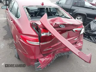 2019 Ford Fusion Titanium with VIN 3FA6P0K98KR179513, listed as a IAAI auction lot 41820059 with 112,155 mi miles. Bid and sale history available at carsss.com. Image 6.