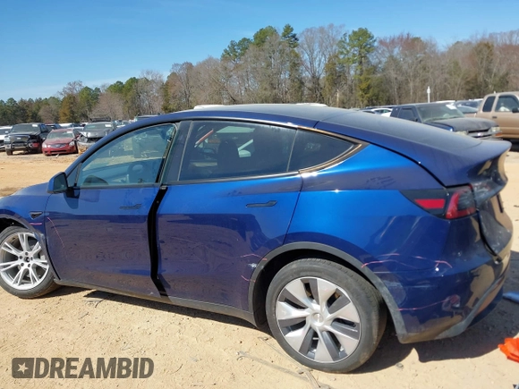 2023 Tesla Model Y Long Range with VIN 7SAYGDEE6PF847890, listed as a IAAI auction lot 41635687 with 32,846 mi miles and . Bid and sale history available at DreamBid. Image 15.