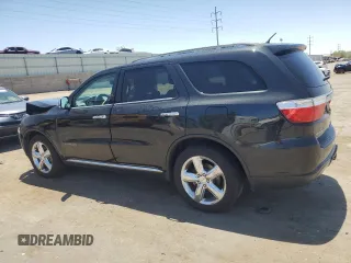 2013 Dodge Durango Citadel with VIN 1C4RDJEG4DC676544, listed as a Copart auction lot 57597015 with 135,776 mi miles and Salvage title. Bid and sale history available at DreamBid. Image 2.