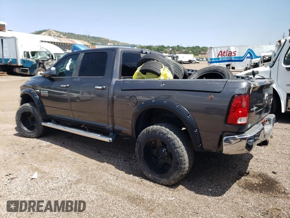 2014 Ram 3500 Big Horn with VIN 3C63R3DJ4EG240542, listed as a Copart auction lot 65465704 with 129,315 mi miles and Salvage Title. Bid and sale history available at carsss.com. Image 2.