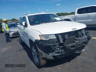 2015 Jeep Grand Cherokee Summit with VIN 1C4RJEJG5FC105038, listed as a IAAI auction lot 42555024 with 133,077 mi miles and . Bid and sale history available at DreamBid. Image 19.