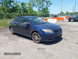 2010 Scion tC with VIN JTKDE3B7XA0306745, listed as a IAAI auction lot 42031219 with 170,551 mi miles. Bid and sale history available at carsss.com. Image 1.