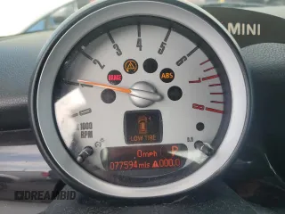 2010 MINI Hardtop S with VIN WMWMF7C59ATZ69213, listed as a Copart auction lot 54270705 with 77,594 mi miles and Salvage Title. Bid and sale history available at DreamBid. Image 9.