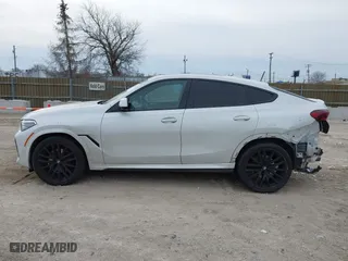 2023 BMW X6 xDrive40i with VIN 5UXCY6C08P9P28397, listed as a IAAI auction lot 41325621 with 66,412 mi miles. Bid and sale history available at carsss.com. Image 14.