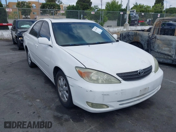 2003 Toyota Camry LE with VIN JTDBE32K530180834, listed as a IAAI auction lot 42255688 with 134,594 mi miles and . Bid and sale history available at DreamBid. Image 6.