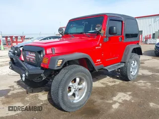 2004 Jeep Wrangler Sport with VIN 1J4FA49S54P744171, listed as a IAAI auction lot 41974657 with 173,230 mi miles. Bid and sale history available at carsss.com. Image 2.
