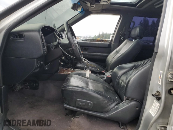 2003 Nissan Pathfinder LE z VIN JN8DR09Y73W801482, wystawiony jako Copart lot #56216005 z przebiegiem 238 781 mil mil oraz Szkoda całkowita • Salvage title. Historia ofert i sprzedaży dostępna na DreamBid. Obrazek 7.