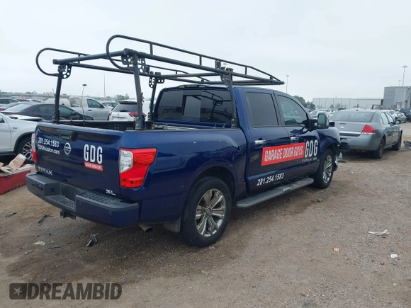 2018 Nissan Titan SV with VIN 1N6AA1E69JN500096, listed as a IAAI auction lot 41883390 with 136,752 mi miles and . Bid and sale history available at DreamBid. Image 4.