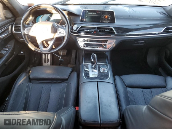 2016 BMW 7 Series 750i xDrive with VIN WBA7B0C59GG526741, listed as a Copart auction lot 86312384 with 90,360 mi miles and Salvage title. Bid and sale history available at DreamBid. Image 8.
