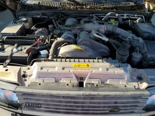 2000 Land Rover Range Rover z VIN SALPV1546YA432866, wystawiony jako Copart lot #72261114 z przebiegiem 69 461 mil mil oraz Nie do naprawy • Non repairable. Historia ofert i sprzedaży dostępna na DreamBid. Obrazek 12.