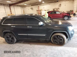 2011 Jeep Grand Cherokee Limited with VIN 1J4RR5GTXBC586647, listed as a IAAI auction lot 42332615 with 151,377 mi miles and . Bid and sale history available at DreamBid. Image 13.