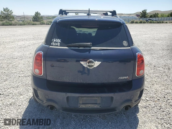 2013 MINI Countryman S ALL4 with VIN WMWZC5C50DWM15256, listed as a Copart auction lot 58080895 with 123,514 mi miles and Salvage title. Bid and sale history available at DreamBid. Image 6.