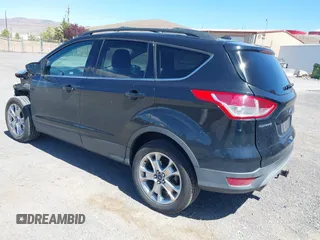 2014 Ford Escape SE z VIN 1FMCU9G97EUB64559, wystawiony jako IAAI lot #42238726 z przebiegiem 124 633 mil mil oraz . Historia ofert i sprzedaży dostępna na DreamBid. Obrazek 3.