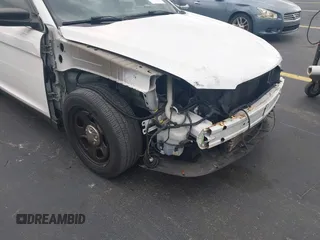 2015 Ford Police Interceptor with VIN 1FAHP2L83FG149326, listed as a IAAI auction lot 42477215 with 90,679 mi miles and . Bid and sale history available at DreamBid. Image 18.