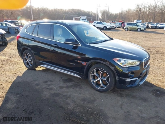 2017 BMW X1 xDrive28i with VIN WBXHT3Z33H4A65699, listed as a IAAI auction lot 41752257 with 66,306 mi miles. Bid and sale history available at carsss.com. Image 1.