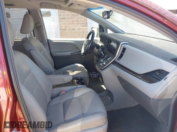 2015 Toyota Sienna XLE with VIN 5TDYK3DC3FS666438, listed as a IAAI auction lot 42117980 with 121,084 mi miles and . Bid and sale history available at DreamBid. Image 5.