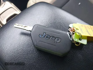 2021 Jeep Wrangler Unlimited Willys с VIN 1C4HJXDNXMW815548, выставлен на аукционе IAAI как лот 42226665 с пробегом 55 457 миль миль и . История ставок и продаж доступна на DreamBid. Изображение 11.