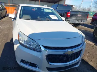 2014 Chevrolet Malibu LTZ with VIN 1G11J5SX0EF289841, listed as a IAAI auction lot 41669908 with 233,599 mi miles. Bid and sale history available at carsss.com. Image 6.