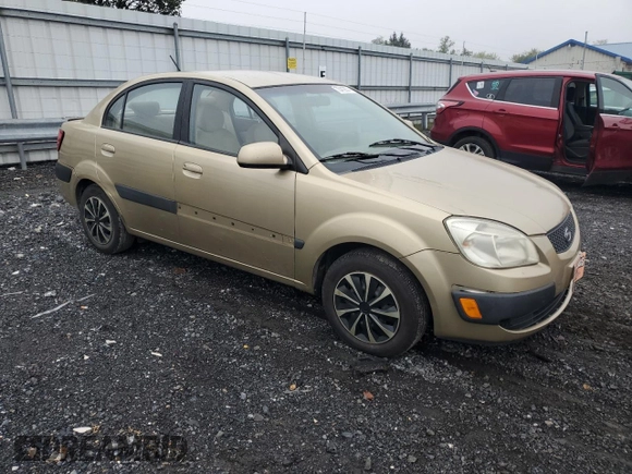 2009 Kia Rio LX with VIN KNADE223096485561, listed as a Copart auction lot 73412874 with 137,858 mi miles and Salvage Title. Bid and sale history available at DreamBid. Image 4.