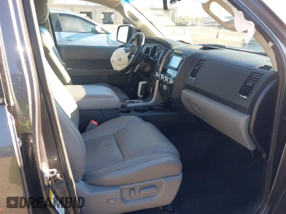2016 Toyota Sequoia Limited with VIN 5TDJY5G16GS140022, listed as a IAAI auction lot 40995557 with 116,032 mi miles. Bid and sale history available at carsss.com. Image 5.