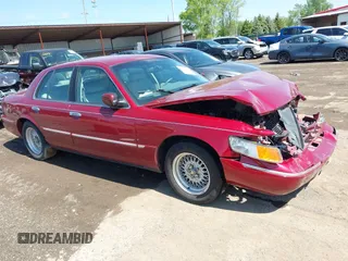 2002 Mercury Grand Marquis LS Premium z VIN 2MEFM75W22X653775, wystawiony jako IAAI lot #42225138 z przebiegiem 124 749 mil mil oraz . Historia ofert i sprzedaży dostępna na DreamBid. Obrazek 1.