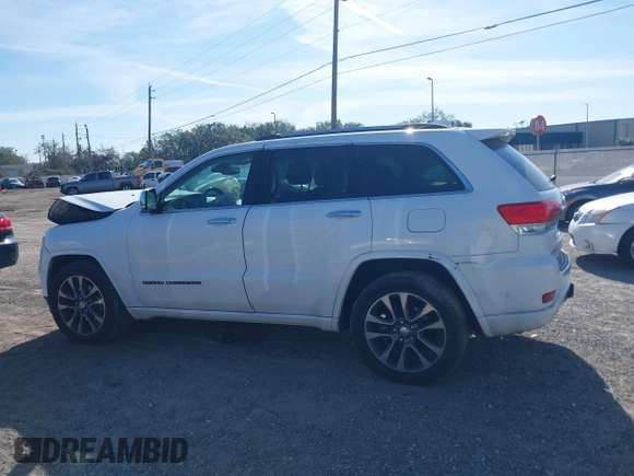 2017 Jeep Grand Cherokee Overland z VIN 1C4RJECG5HC959981, wystawiony jako IAAI lot #41638958 z przebiegiem 102 122 mil mil oraz . Historia ofert i sprzedaży dostępna na DreamBid. Obrazek 14.