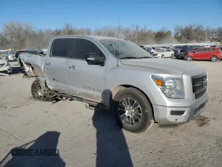 2020 Nissan Titan Platinum Reserve with VIN 1N6AA1EFXLN511854, listed as a Copart auction lot 83450044 with 75,894 mi miles and Salvage title. Bid and sale history available at DreamBid. Image 4.