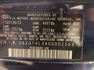 2016 Kia Optima LX with VIN 5XXGT4L34GG002569, listed as a IAAI auction lot 41732810 with 148,044 mi miles. Bid and sale history available at carsss.com. Image 9.