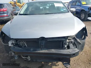 2014 Volkswagen Passat Wolfsburg Ed with VIN 1VWAT7A38EC089882, listed as a IAAI auction lot 41945624 with 130,162 mi miles. Bid and sale history available at carsss.com. Image 6.