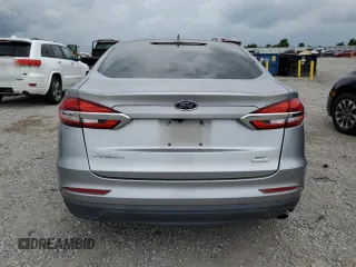2020 Ford Fusion SE with VIN 3FA6P0HDXLR113882, listed as a Copart auction lot 57677215 with 104,459 mi miles and Salvage title. Bid and sale history available at DreamBid. Image 6.
