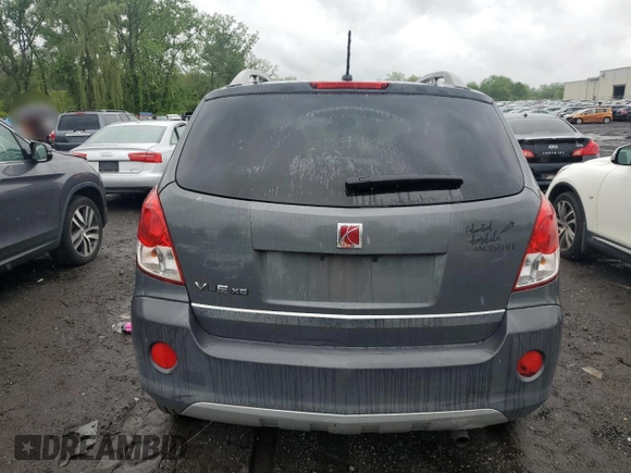 2009 Saturn VUE XE z VIN 3GSCL33P69S509003, wystawiony jako Copart lot #57164165 z przebiegiem 134 858 mil mil oraz Szkody całkowita. Historia ofert i sprzedaży dostępna na DreamBid. Obrazek 6.