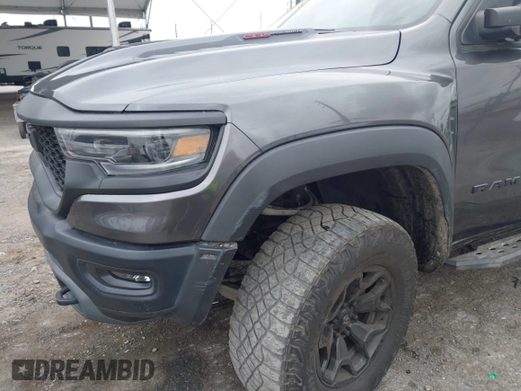 2022 Ram 1500 TRX with VIN 1C6SRFU98NN334983, listed as a IAAI auction lot 42010145 with 19,207 mi miles and . Bid and sale history available at DreamBid. Image 18.