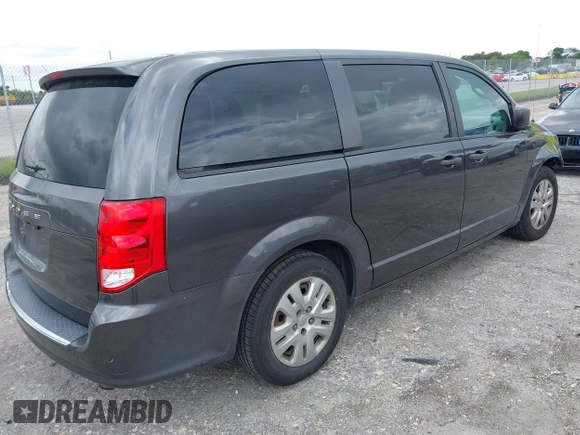 2019 Dodge Grand Caravan SE with VIN 2C4RDGBGXKR796974, listed as a IAAI auction lot 42008704 with 129,229 mi miles and . Bid and sale history available at DreamBid. Image 4.