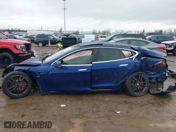 2016 Tesla Model S 90D with VIN 5YJSA1E44GF169960, listed as a IAAI auction lot 41523807 with 124,738 mi miles and . Bid and sale history available at DreamBid. Image 14.