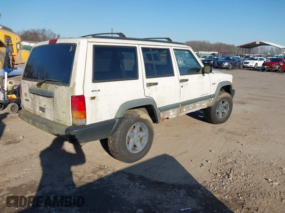 1997 Jeep Cherokee Sport with VIN 1J4FJ68S3VL551278, listed as a IAAI auction lot 41660577 with 282,264 mi miles. Bid and sale history available at carsss.com. Image 4.