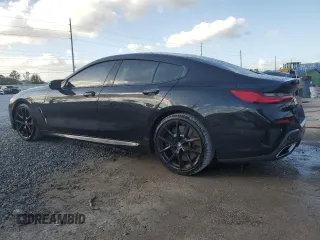 2023 BMW 8 Series M850i with VIN WBAGV8C02PCK67527, listed as a Copart auction lot 80470154 with 17,873 mi miles and Salvage Title. Bid and sale history available at carsss.com. Image 2.